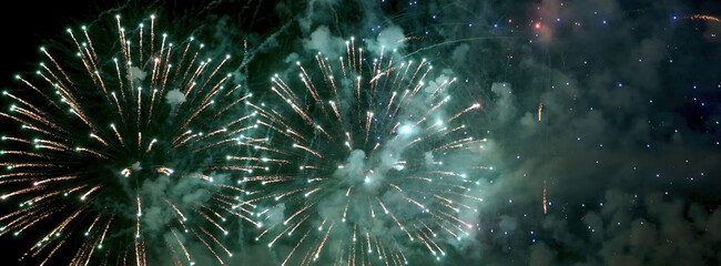 Banner Green firework in night time celebrate national holiday. Green Firework celebrate anniversary happy new year 2025 4th of july holiday festival. Countdown New year 2025 festival with copy space