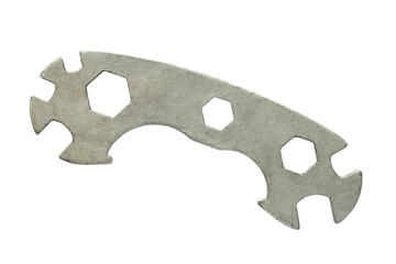 An old combined wrench for bike repair. Wrench isolated on a white background.