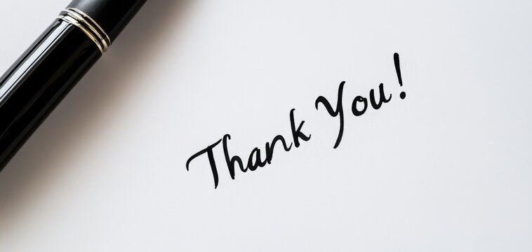Handwritten Signature of 'Thank You!' in Black Ink on White Background
