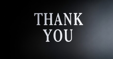 white  text "THANK YOU"  on black background