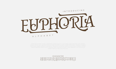 Obraz premium Euphoria typography beauty fashion elegant minimalist serif italic fonts decorative wedding vintage retro logos. Minimal luxury font alphabet logo. Vector illustration