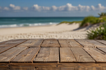 Empty wooden tabletop with a blurred white sand beach, perfect for product display.
