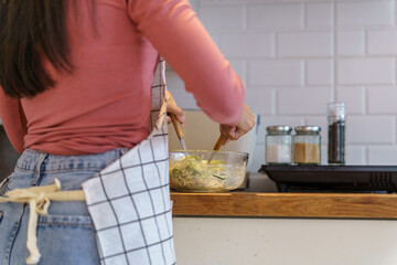 Asian woman preparing vegetable salad in the kitchen Healthy Food Healthy Cooking dieting Weight...