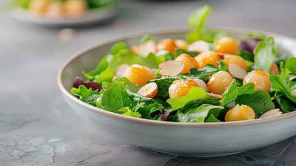 A vibrant salad with fresh lychees, mixed greens, almonds, and honey-lime vinaigrette.