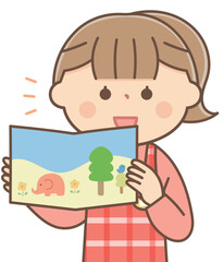 絵本の読み聞かせをする保育士の女性