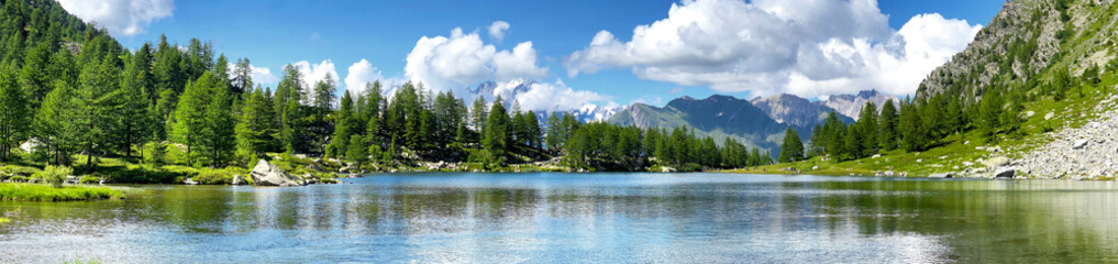 beautiful scenic panorama in alpine mountain with lake in Aosta valley Italy.