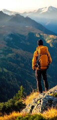 Obraz premium A hiker in an orange backpack stands on a mountain ridge, overlooking a scenic landscape at sunset.
