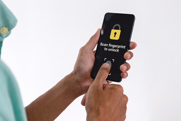 Man unlocks a smartphone by scanning fingerprint on screen. Security access with biometric identification concept.