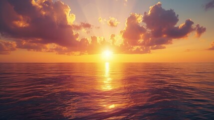 Fototapeta premium Scenic golden hour sky over the sea