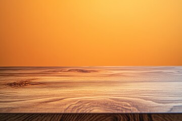 Obraz premium A close-up view of a wooden tabletop with a smooth, polished surface, set against a plain
