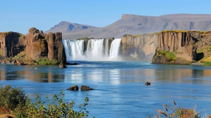 Stunning waterfall cascading through iceland s breathtaking landscapes and natural wonders