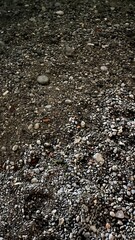 Texture of wet stone in evening contrasting light. Photo of the Moraca River, Montenegro. High quality photo. High quality photo