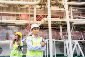 Engineers, both male and female, play a vital role in the power industry, developing energy solutions that impact business success and industrial development across continents.