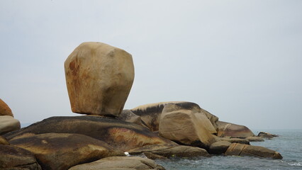 Seaside boulders or monoliths