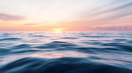 Obraz premium The smooth surface of the sea at sunrise, with soft pastel colors in the sky-4
