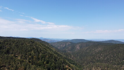 Naklejka premium Very beautiful wooded mountain peaks