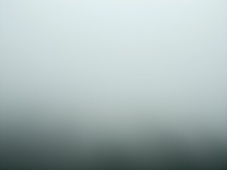 Fototapeta premium Foggy morning forest background with muted green tones
