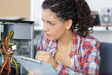female technician working with transistor