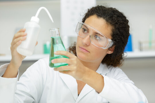 cientist checking the results of testing