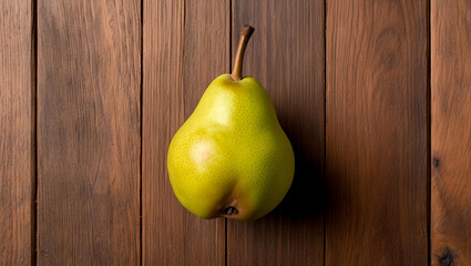 Ripe sweet pear isolated on wooden background, Juicy fresh pear on a wooden table, Fresh pear on a wooden background with copy space