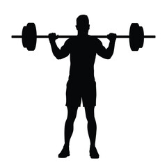 Silhouette of a man practicing lifting weights with a barbell