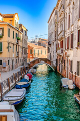 A stunning and beautiful view of a picturesque Venice canal, showcasing vibrant architecture and tranquil waters