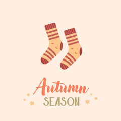 Autumn socks postcard. Fall season card. Warm clothing. Cozy wear
