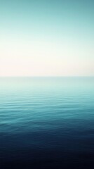 Fototapeta premium A serene sea landscape with gentle waves, offering a tranquil atmosphere and a soothing color palette for relaxation.