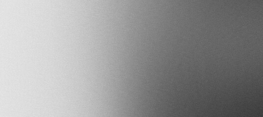 Subtle gradient fading from light to dark on a brushed metal texture background