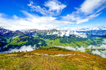 View from Schatzberg of the surrounding landscape. Idyllic nature in Wildschönau in the Kufstein district in Austria. Mountain landscape in the Kitzbühel Alps in Tyrol.
