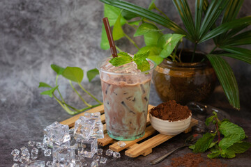 Chocolate, milk and mint are flavoured and blended into a drink.