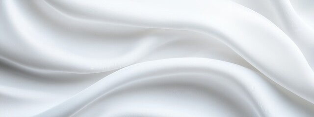 Fototapeta premium A tight shot of a white cloth, displaying undulating patterns at its upper and lower edges