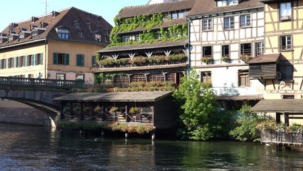 Strasbourg, France. Petite France quarter. Historic houses on the banks of the Ill River