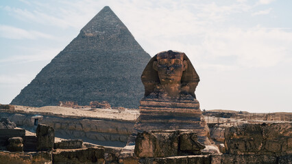 Sphinx statue and Cheops pyramid in Giza Egypt