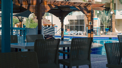 empty cafe near the pool without people