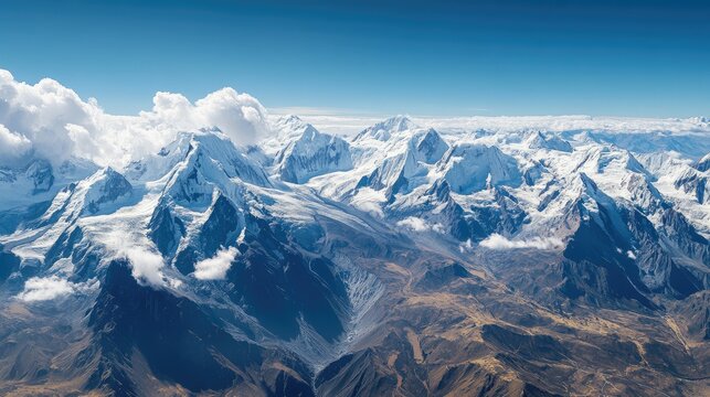 Bird's-eye view of the expansive, snow-covered peaks and glaciers of the Huascaran National Park