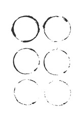 A set of textures: round marks from glasses with ink. Vector illustration.