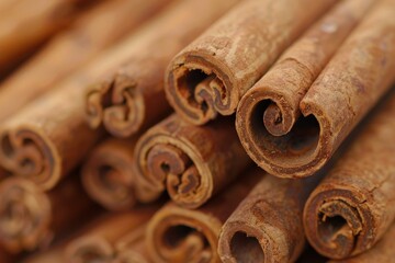 Macro close up of a stack of cinnamon sticks forming a background