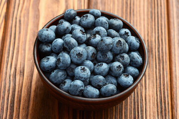 Blueberry photography in a bowl on rustic background
