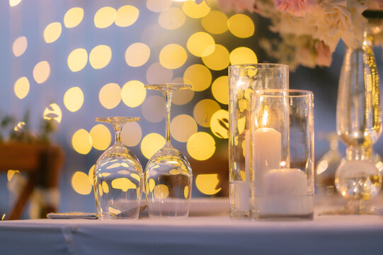 Dinner table decorated with beautiful flowers.