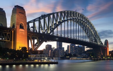 Obraz premium Sydney Harbour Bridge with City Skyline Sunrise Background