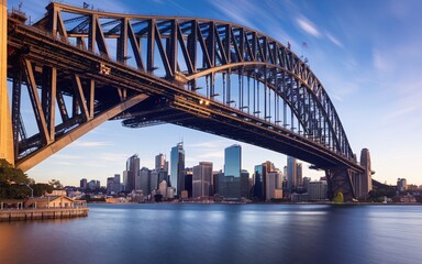 Obraz premium Sydney Harbour Bridge with City Skyline Sunrise Background