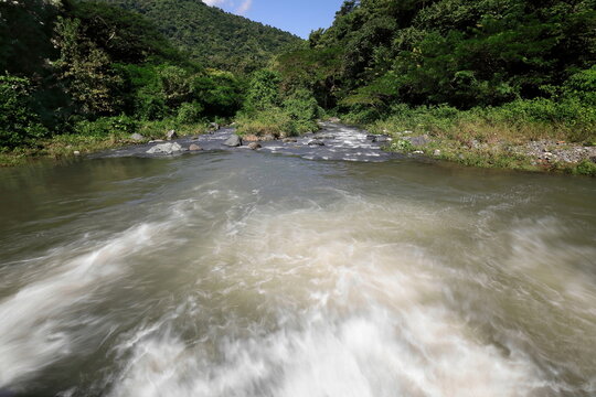 Rapids on the Rio Yara River, downstream the road bridge way down from Santo Domingo Village in the Sierra Maestra Range mountains. Granma-Cuba-418