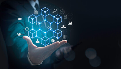 businessman showing a smart contract and executing a cryptocurrency transaction with blockchain technology. The transaction is secure and transparent, and there are other people in the background.