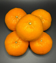 Top View of Fresh Oranges Arranged in a Circle.