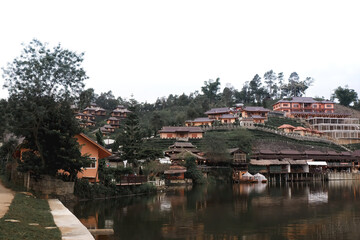 Old chinese style house in tea plantation at Ban Rak Thai the village is surrounded by mountain in Mae Hong Son, Thailand. A village of Chinese settlement is travel destination in Mae Hong Son