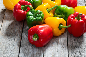 Fresh sweet bell pepper ( paprika ) photography red , green and yellow . Colorful vegetable . Top view