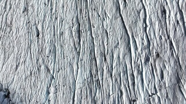 Birds eye view of rugged white rocky surface of mountain at Rhonegletscher, Furkapass, Switzerland.