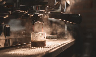 espresso machine pouring espresso coffee