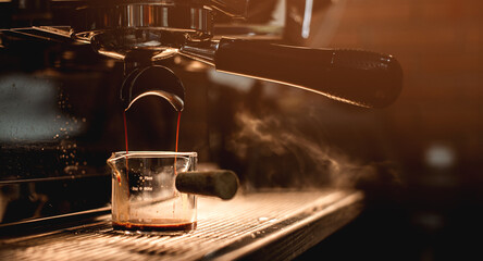 espresso machine pouring espresso coffee